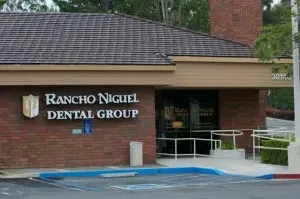 Rancho Niguel Dental Group — brick building with entrance and signage